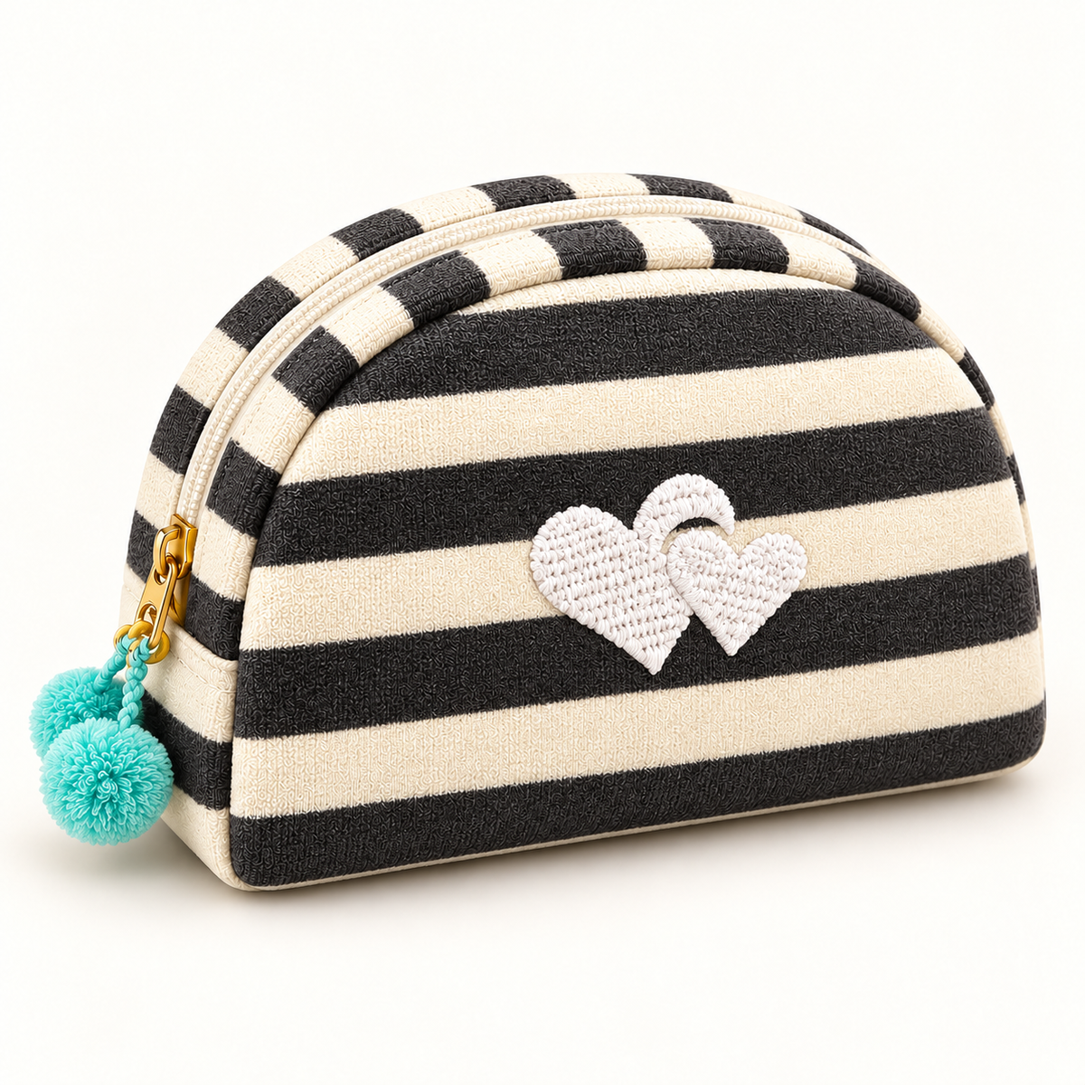 Black & Ivory striped makeup pouch with embroidered personalization example and pom-pom zipper detail.