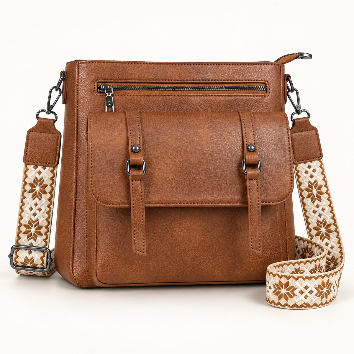 OVWQT Camden Heritage Crossbody Bag in Cognac Brown with a cream and brown geometric woven strap.